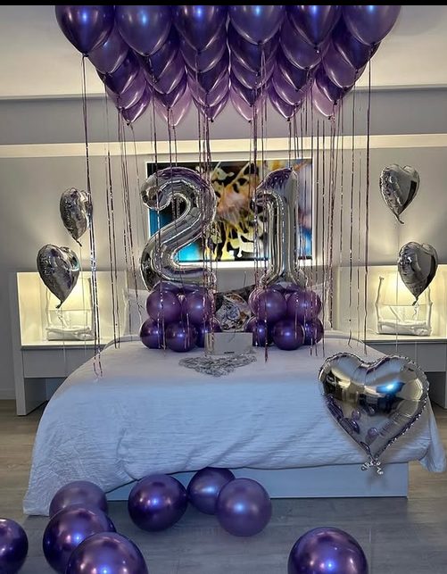 21st birthday bed reveal with number balloons